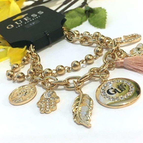 3/$29! GUESS Charm Bracelet Tassel, Elephant, Leaf - Picture 3 of 7